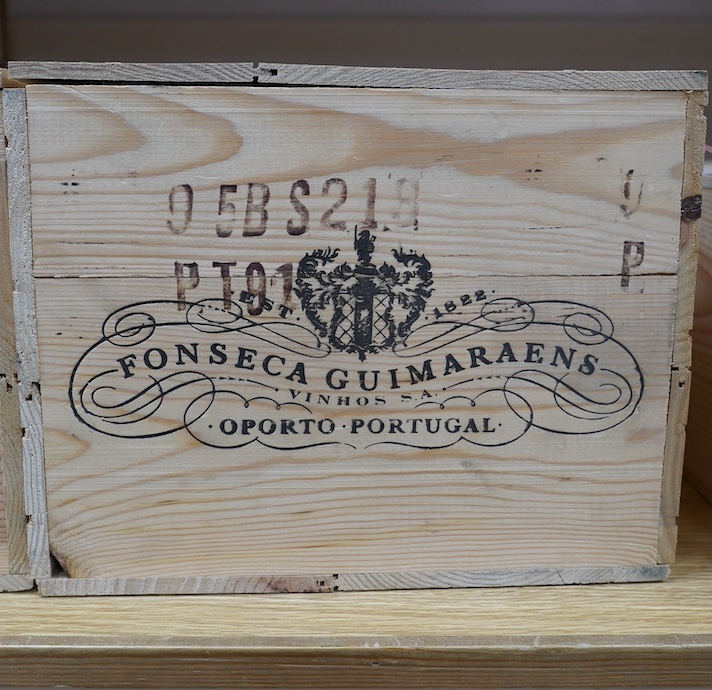 Two sealed wood cases of twelve bottles (twenty-four bottles) of 1992 Fonseca Vintage Port, in OWC's, purchased en primeur from The Wine Society. Condition - good